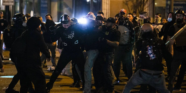 Violence erupts in Washington as protesters clash with Trump supporters