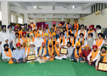 Artists participating in a painting workshop