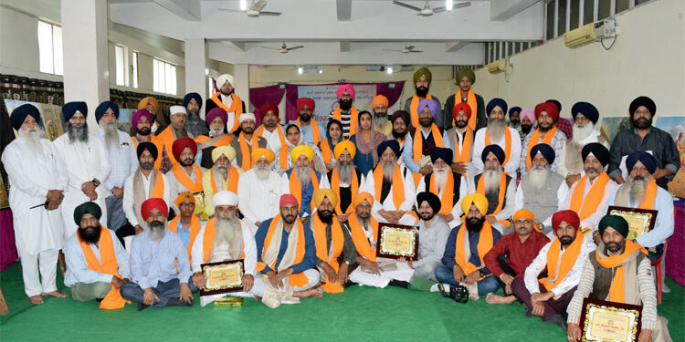 Artists participating in a painting workshop