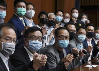 Hong Kong disqualifies four pro-democracy lawmakers