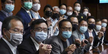 Hong Kong disqualifies four pro-democracy lawmakers