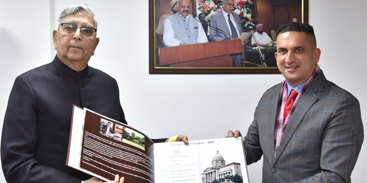 LOKPAL VINOD KUMAD  RELEASES COFFEE TABLE BOOK ON VISUALS OF COMPARATIVE STUDY